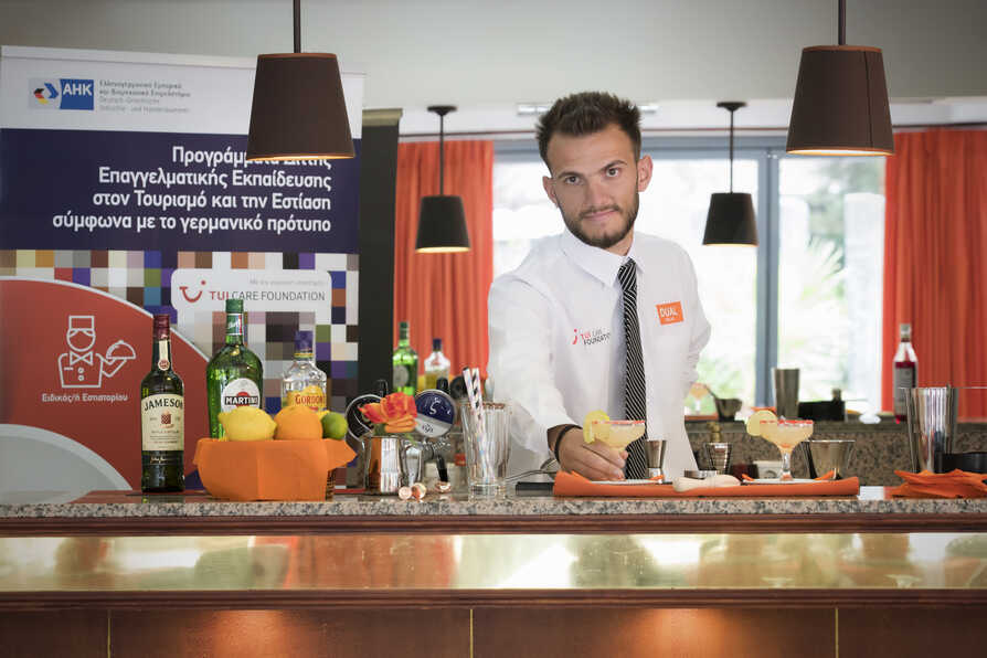 TUI Academy Greece Young Man Serving Cocktail