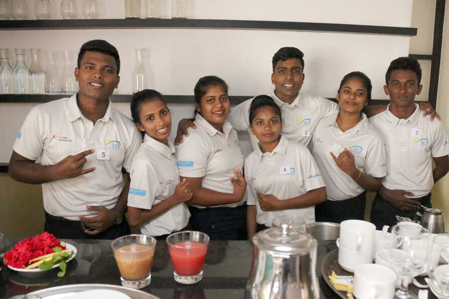 TCF_Sri_Lanka_students behind table